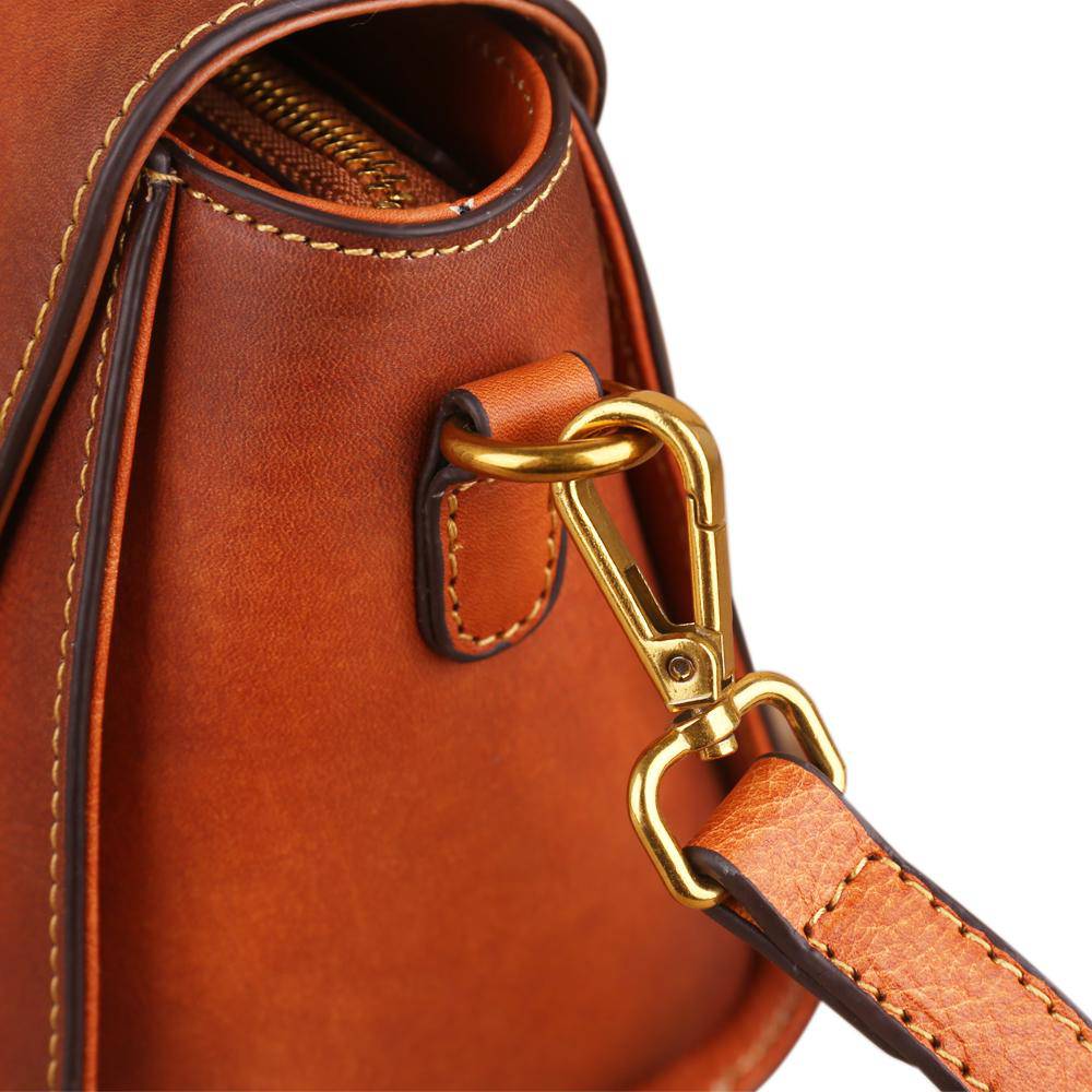 Women's vintage leather tote handbag with small top-handle, Rossie Viren, showcasing a classic, stylish design.