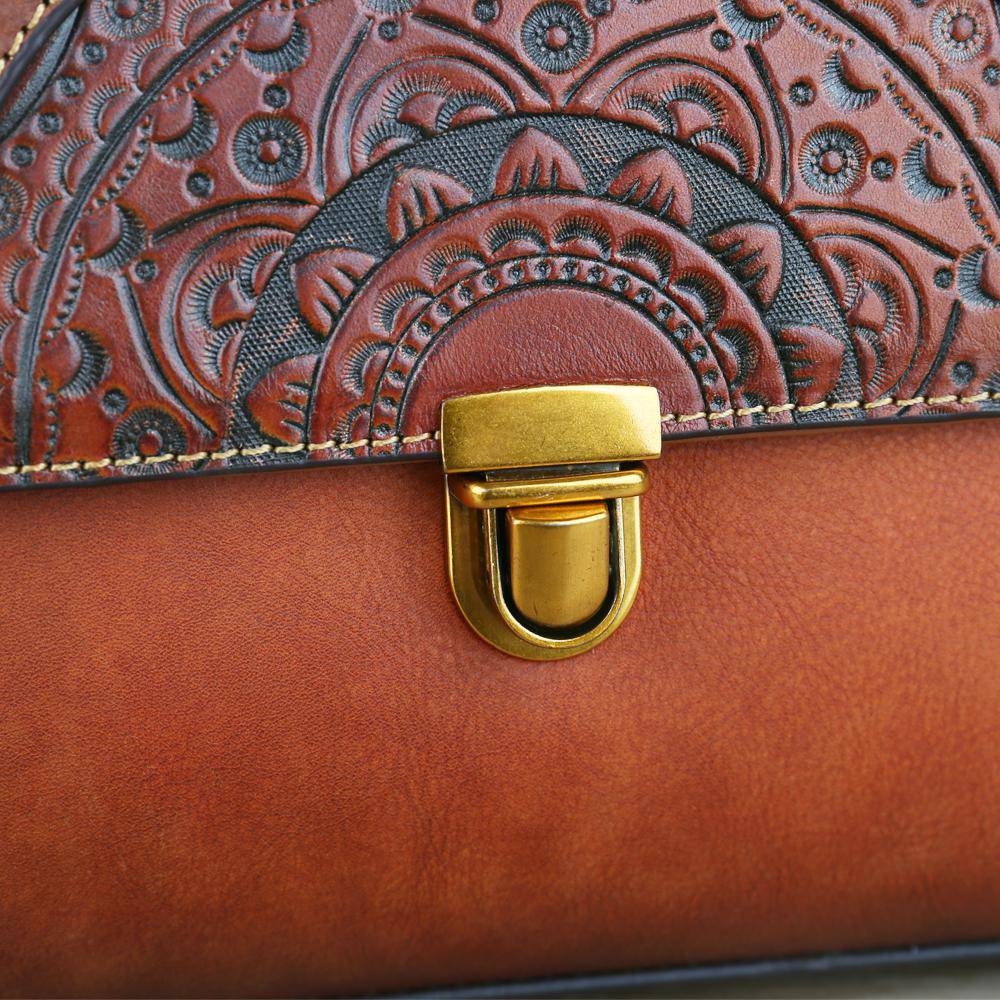 Women's vintage leather tote handbag with small top-handle, stylish and spacious, by Rossie Viren, perfect for everyday use.
