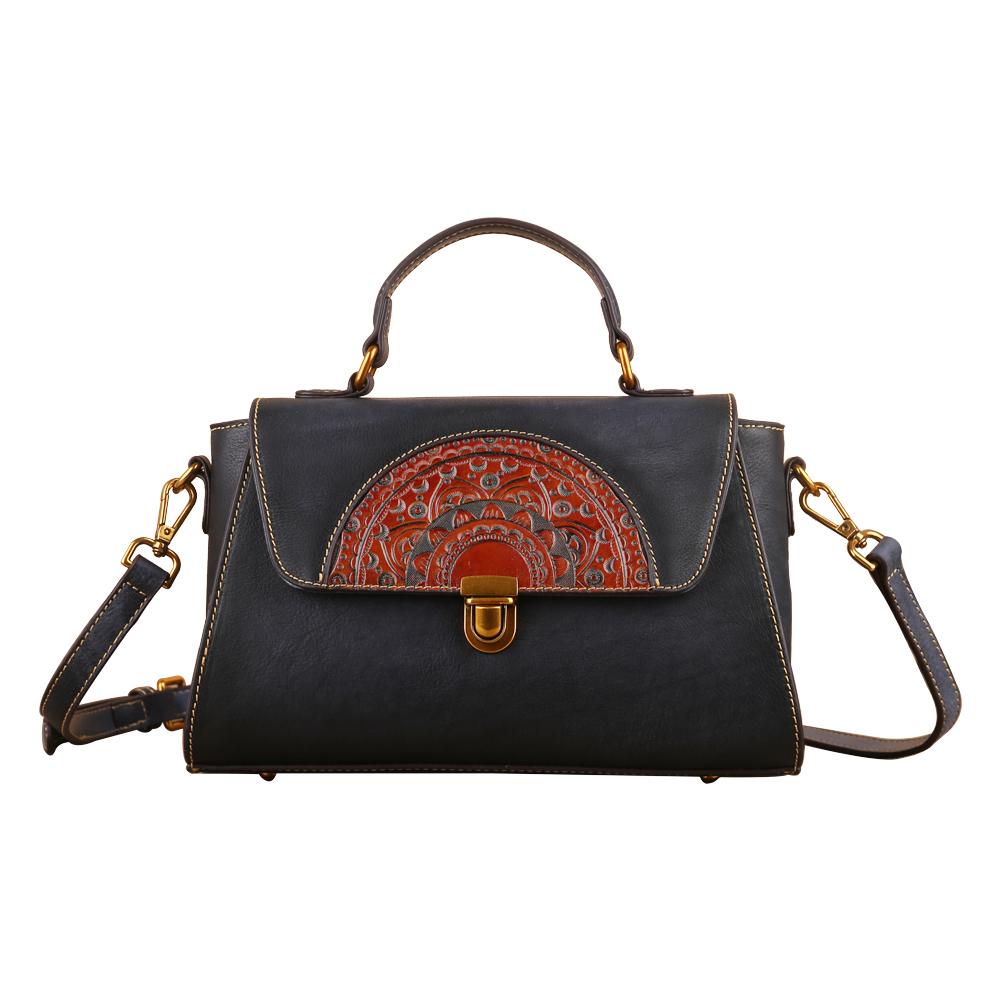 Women's vintage leather tote handbag with top-handle, small size, stylish design from Rossie Viren.
