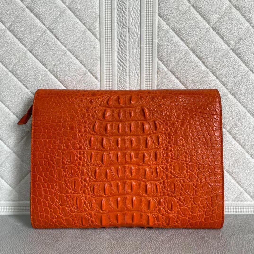Rossie Viren women's genuine crocodile leather clutch with card holder design, showcasing a sleek, textured crocodile pattern.