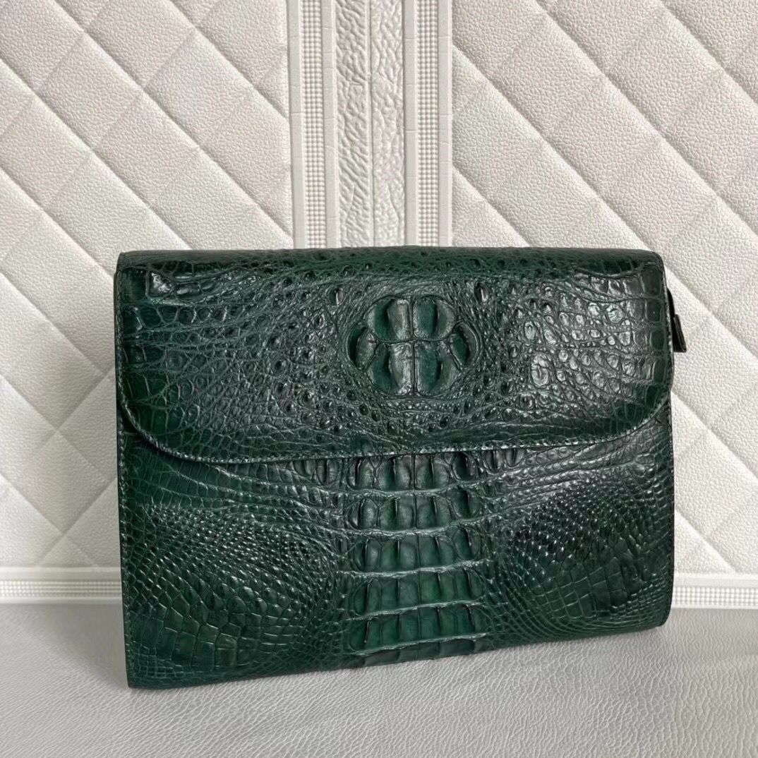 Women's genuine crocodile leather clutch from Rossie Viren, featuring a sleek card holder design with textured crocodile pattern.