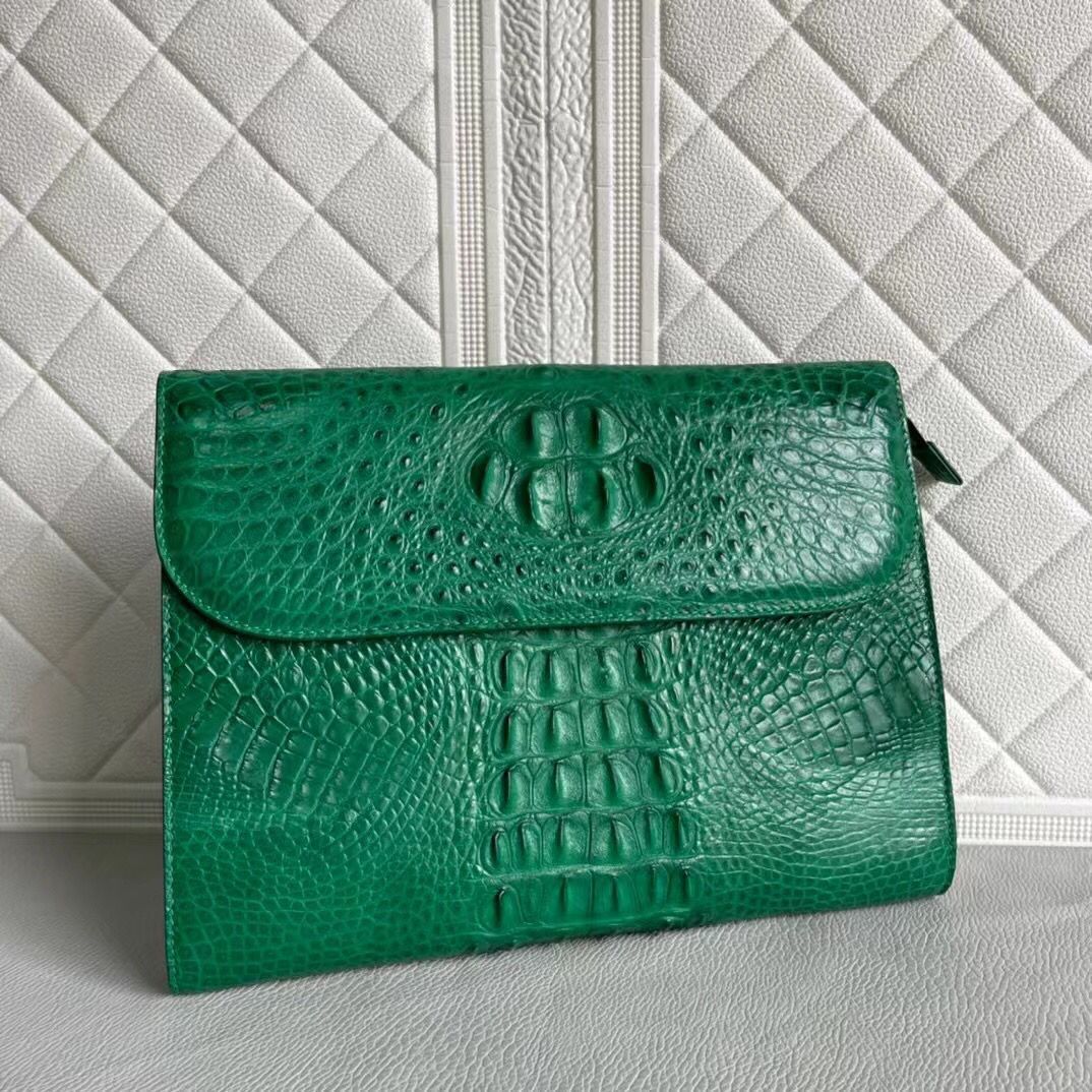 Women's genuine crocodile leather clutch card holder by Rossie Viren, featuring a sleek, textured crocodile pattern and compact design.