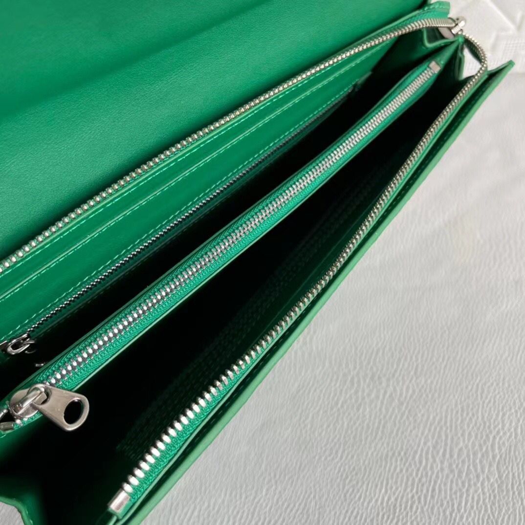 Women's genuine crocodile leather clutch card holder by Rossie Viren, featuring a sleek and textured design with a secure closure.