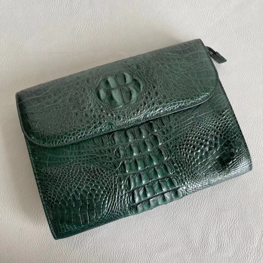 Women's genuine crocodile leather clutch card holder by Rossie Viren, featuring a sleek, textured design and compact size.
