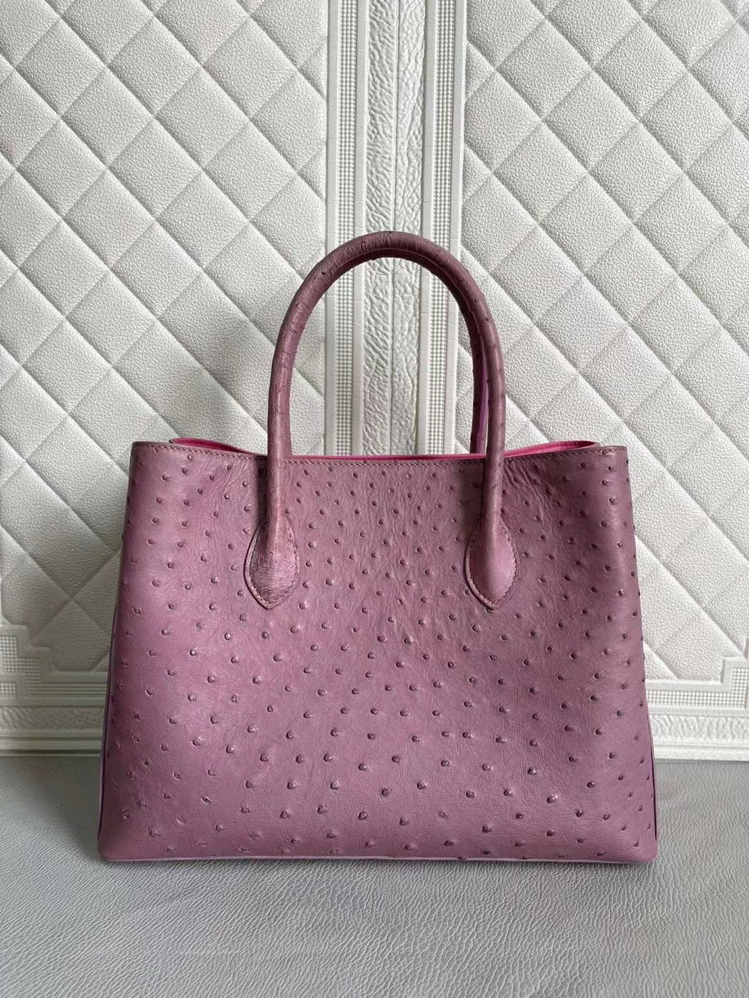 Women's Rossie Viren ostrich leather handbag with top handle and cross-body strap in blue and purple, 33cm size.